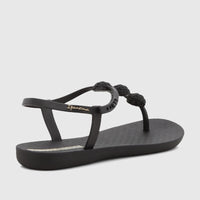 Black Ipanema Class Posh Sandal with a T-strap design and braided detail, shown from a side view.