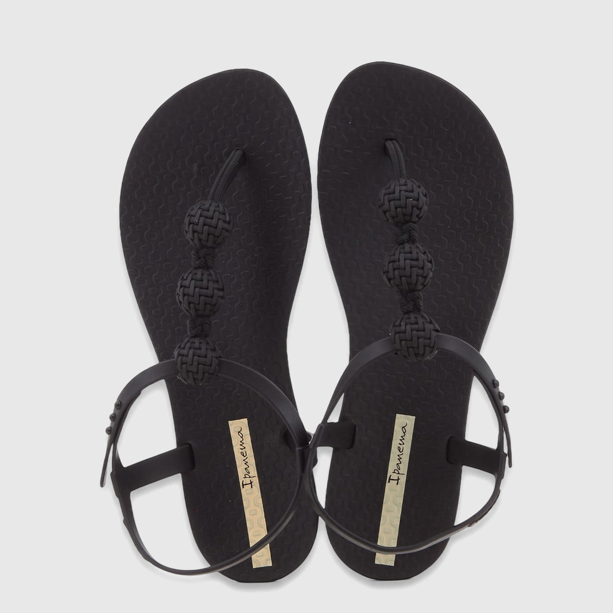 Pair of black Ipanema Class Posh thong sandals with braided details and adjustable ankle straps, viewed from above.