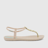 Ipanema Fundo Do Mar women's thong sandal in beige with a gold seashell-inspired strap, presented in a side view.