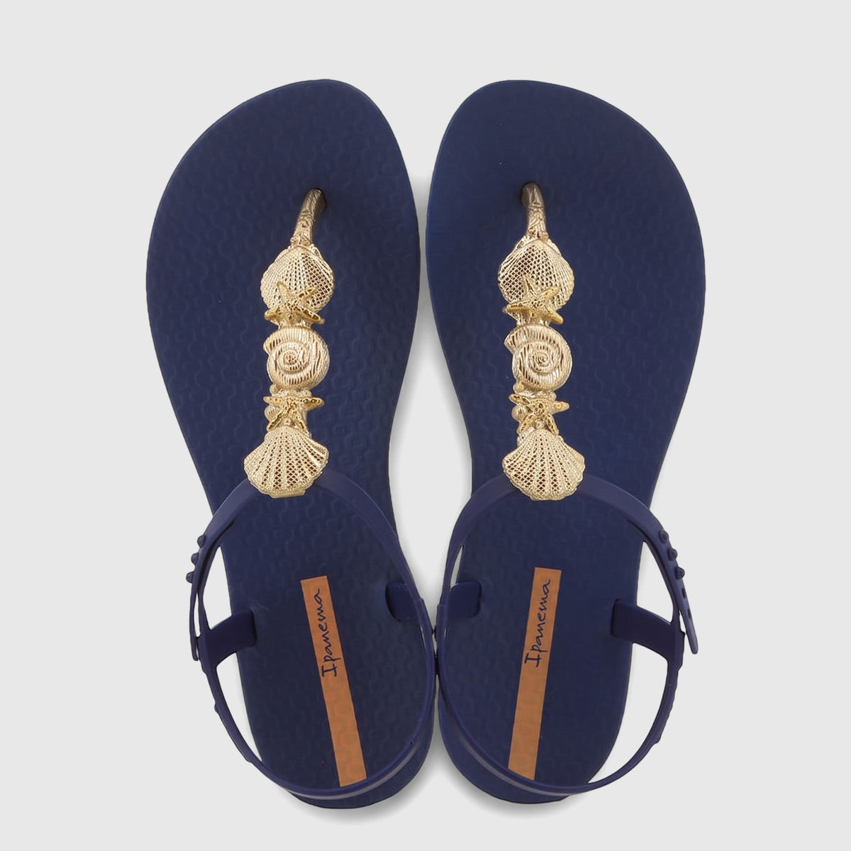 Ipanema Fundo Do Mar Sandal GIL84015 in navy blue with gold metallic seashell and starfish embellishments.