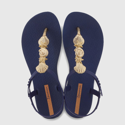 Blue and gold Ipanema Fundo Do Mar sandal with a decorative metallic T-strap, featuring an adjustable ankle strap and wavy