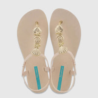 Ipanema Fundo Do Mar thong sandals in beige with gold seashell and starfish embellishments, photographed from an overhead
