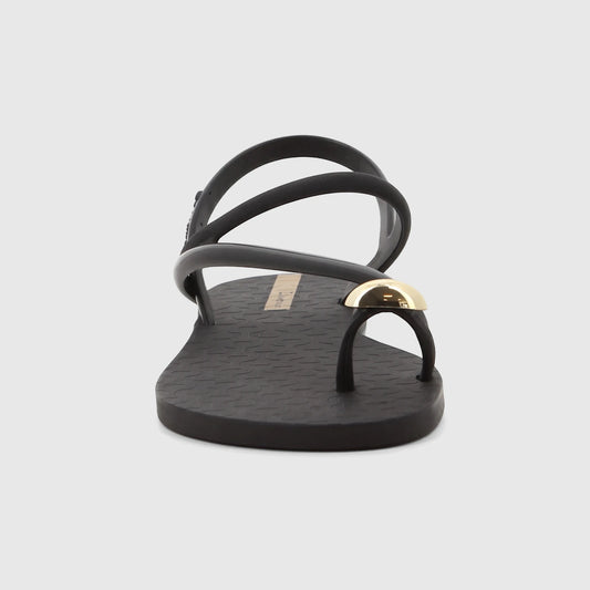 Black Ipanema Glam Ring Sandal with a gold ring detail on the toe post, showcasing its sleek design from a side profile.