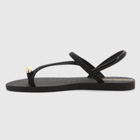 Ipanema Glam Ring Sandal in black with a gold toe ring detail, shown in a side profile view.