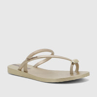 Ipanema Glam Ring Thong sandal in beige gold, featuring a stylish ring detail on the strap, photographed from a side angle.