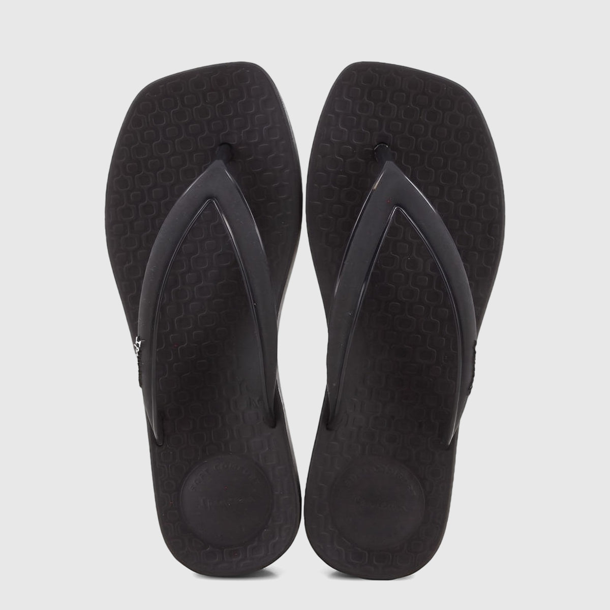 Pair of Ipanema Pluma GIL27516 Black IL183 flip-flops, black with textured soles and a V-shaped strap, shown from an