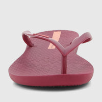 Ipanema Wave Fem burgundy patent flip-flop, seen from a head-on, slightly elevated perspective, showcasing the textured sole.
