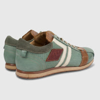 A pair of Kamo-Gutsu Men's Leather Sneaker Tifo 030 in green with brown accents, white stripes, and tan soles, viewed from