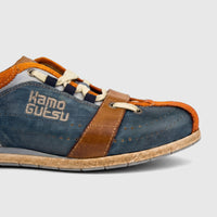 Kamo-Gutsu Men's Tifo 017 sneaker in navy blue, orange, and brown leather, side view.