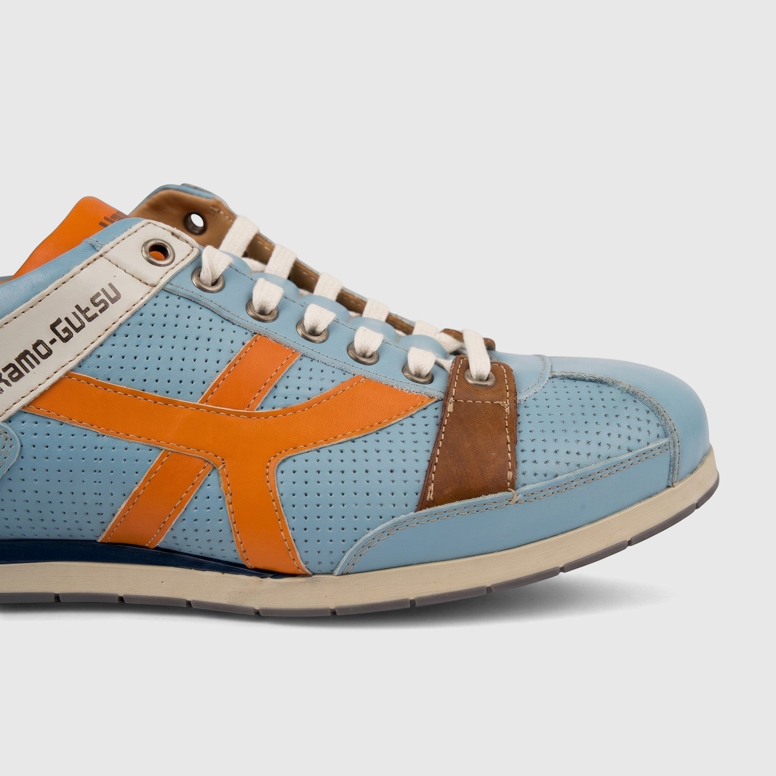 Kamo-Gutsu Men's Tifo 044 sneaker in blue and orange perforated leather, side view
