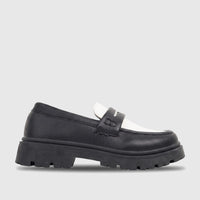 Klevas Boys black and white chunky sole loafer with textured leather upper, featuring a prominent lug sole, viewed from the
