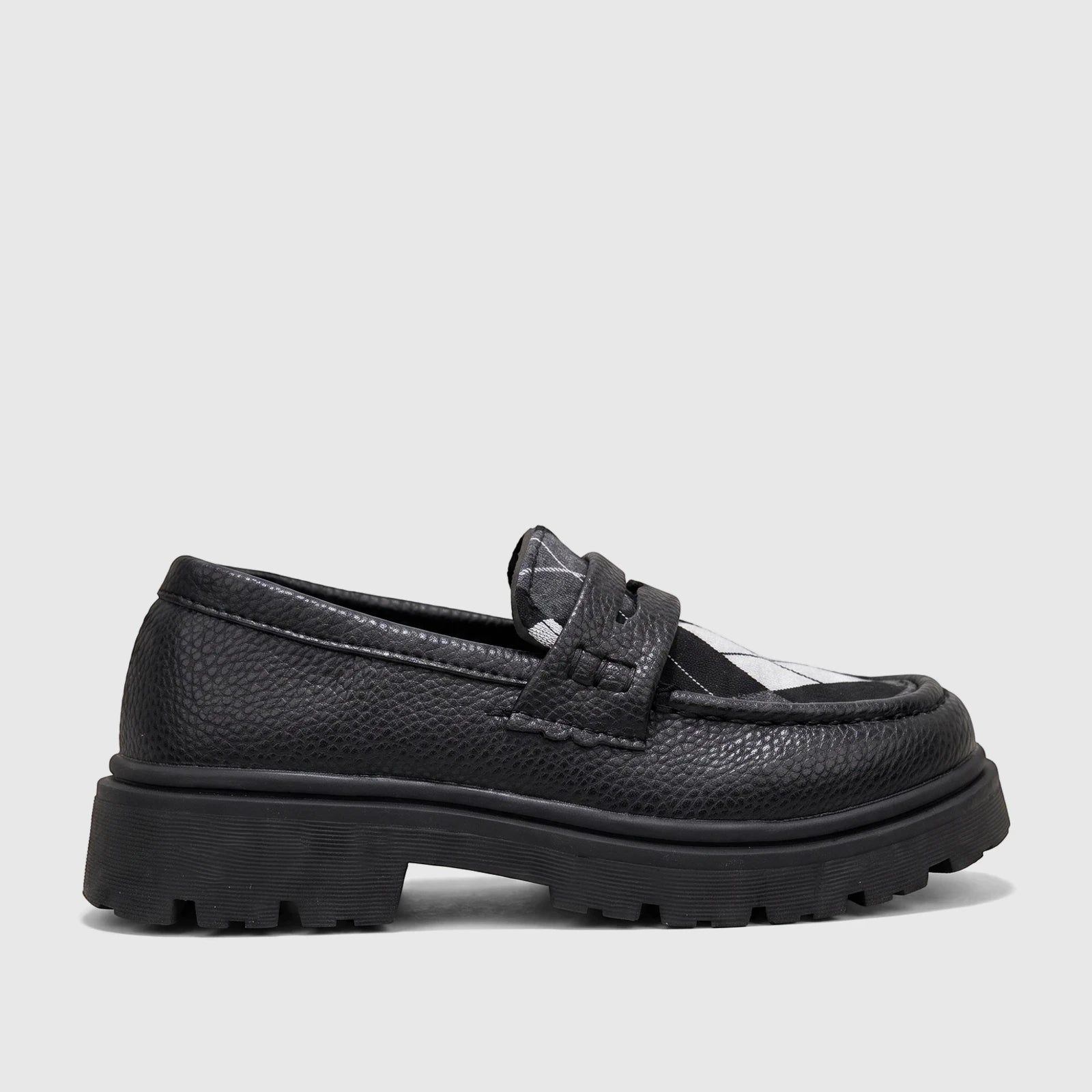 Black Klevas Boys chunky sole loafers with a textured faux leather upper and a black and white argyle pattern on the vamp,