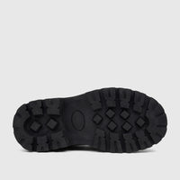 Close-up view of a Klevas Boys chunky sole loafer, featuring a black lug pattern on a robust rubber sole.