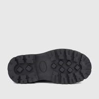 Underside view of a black Klevas Boys chunky sole loafer, showcasing the distinctive diamond and rectangular tread pattern.