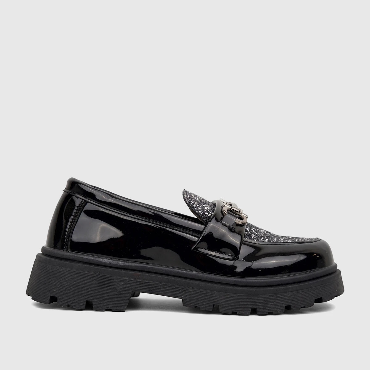Klevas Boys chunky sole loafer in casino black patent finish, featuring a glitter vamp and silver bit buckle, side profile