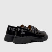 Pair of Klevas Boys Youth chunky sole loafers in black patent leather with silver glitter vamp and metal chain detail, seen