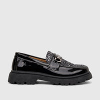 A Klevas Boys Youth chunky sole loafer in shiny black patent leather with a glitter panel and silver buckle.