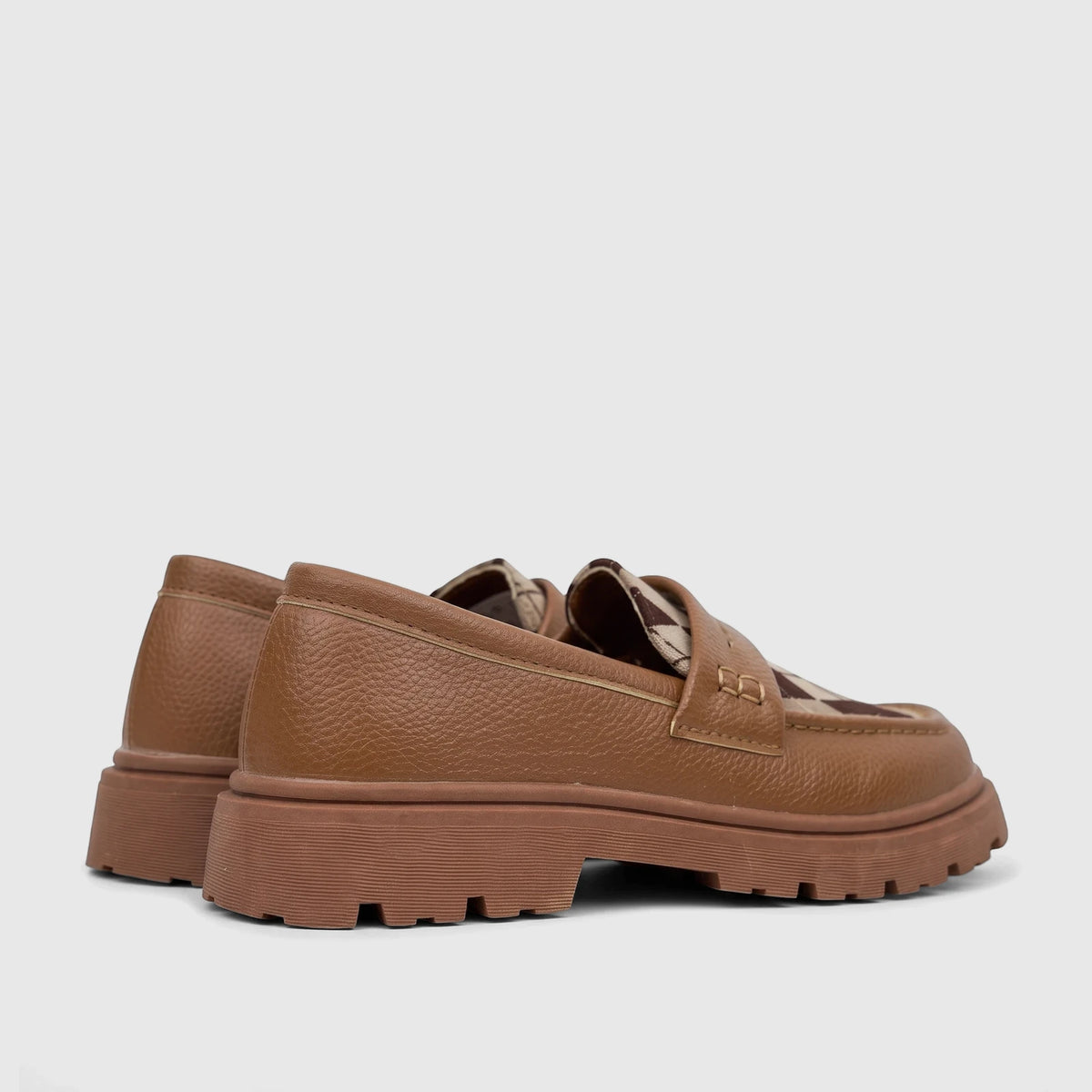 Klevas Boys Youth chunky sole loafers in bowling tan, with textured uppers and a prominent lug sole, viewed from the