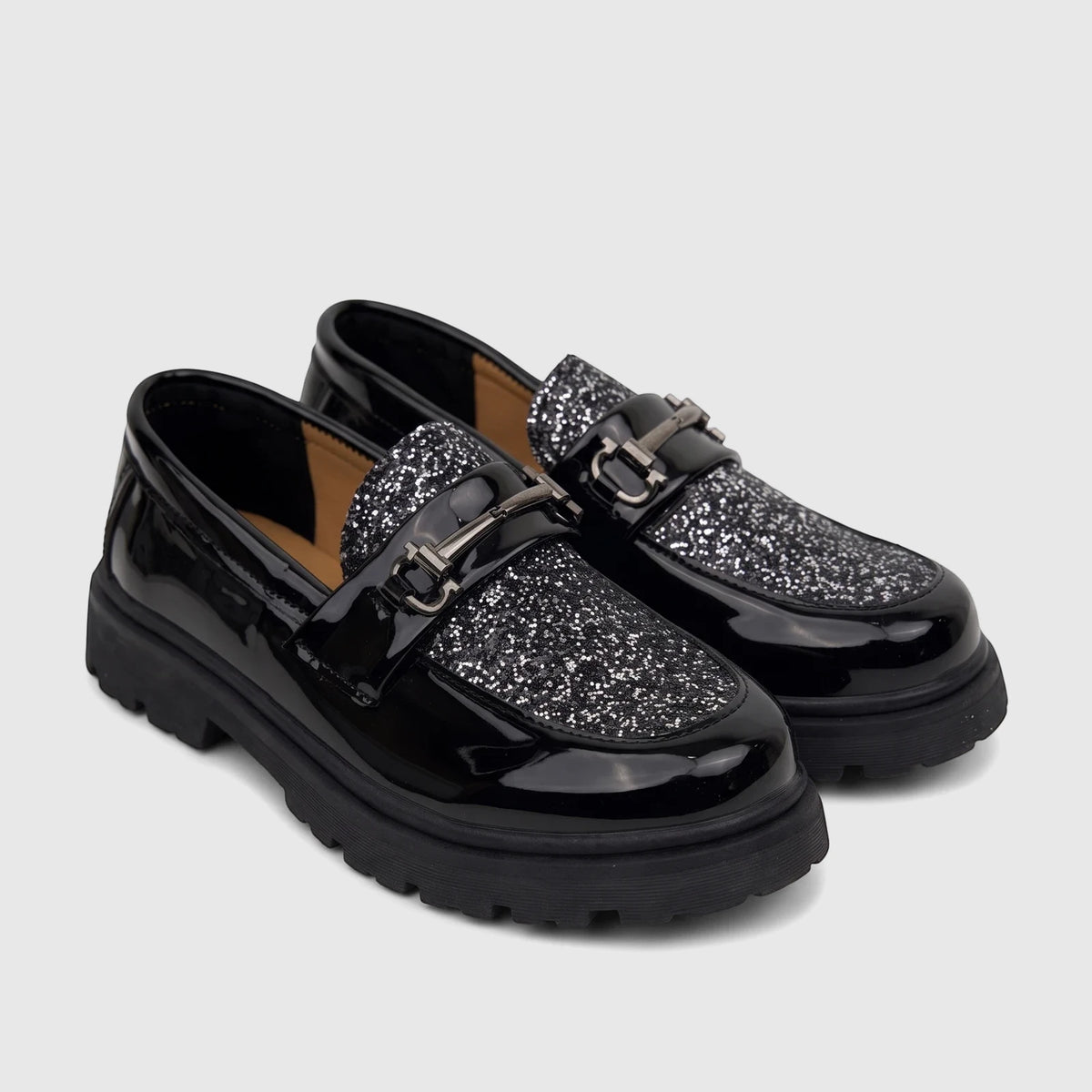 Pair of Klevas Boys Youth Chunky Sole Loafers in Casino Black Patent, with glitter uppers and silver buckle hardware.