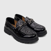 Pair of Klevas Boys Youth Chunky Sole Loafers in Casino Black Patent, with glitter uppers and silver buckle hardware.