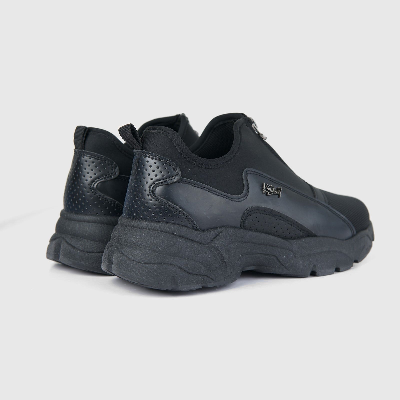 Klevas Ladies Sneaker K7726L Velvet Black Mono, rear side view showing black upper with perforated panels and chunky sole.