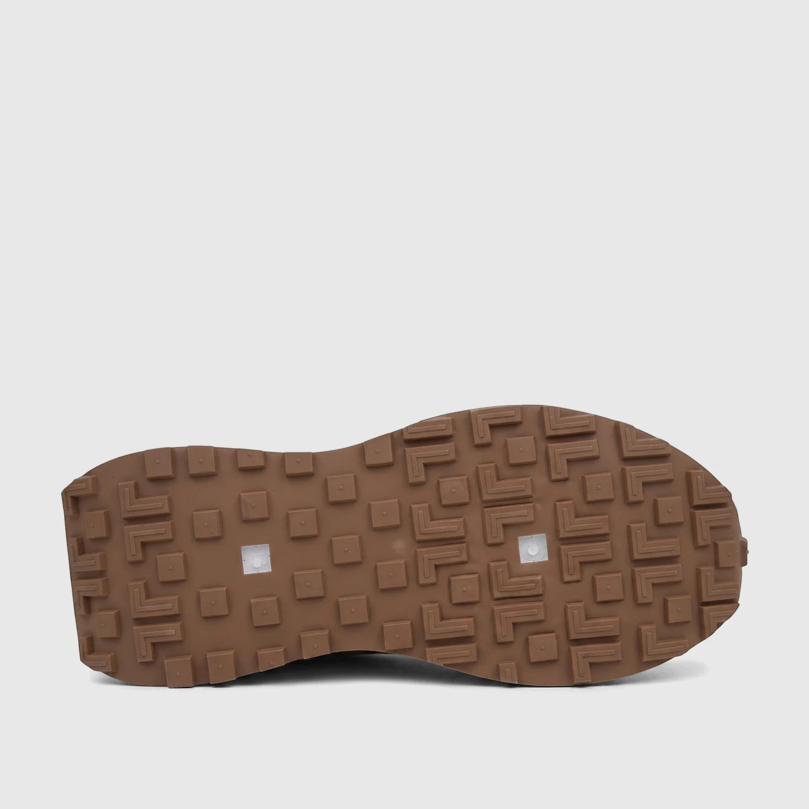 Brown Klevas Men's Casual Sneaker sole, Ice K7623M, featuring distinct L-shaped and square tread patterns.