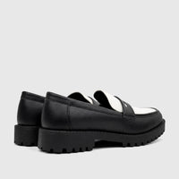 Klevas Men's Chunky Sole Loafer Lufiano K8168M in black and white, featuring a robust lug sole, viewed from the side-rear.