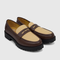 Pair of Klevas Men's chunky sole loafers in brown and beige leather-look material, featuring a lug sole.