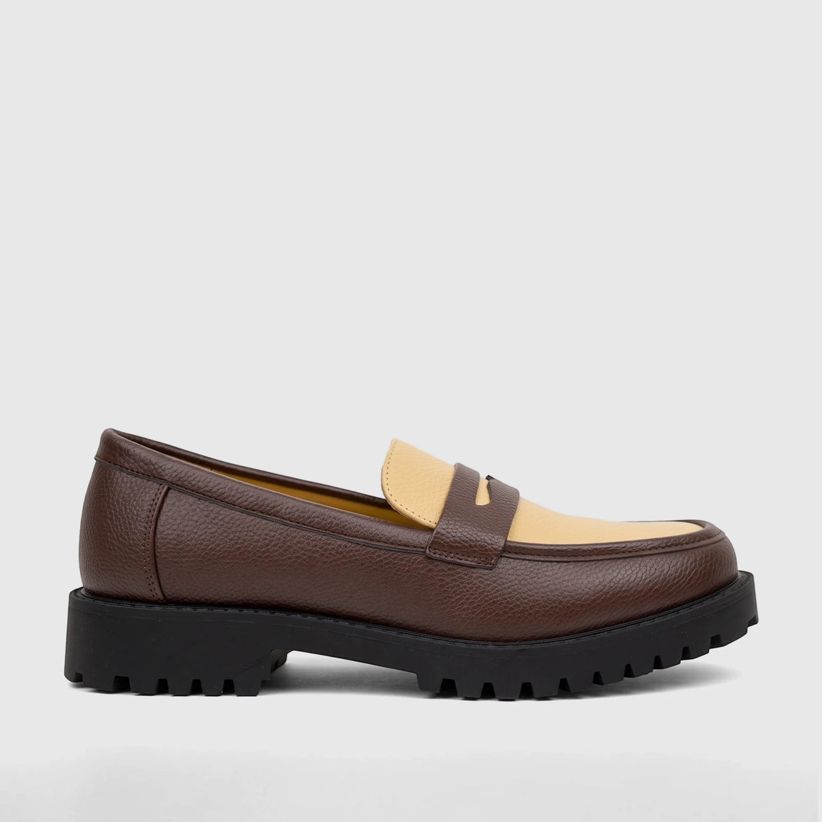 Klevas Men's Chunky Sole Loafer featuring brown and beige textured leather with a thick black sole, shown from a side