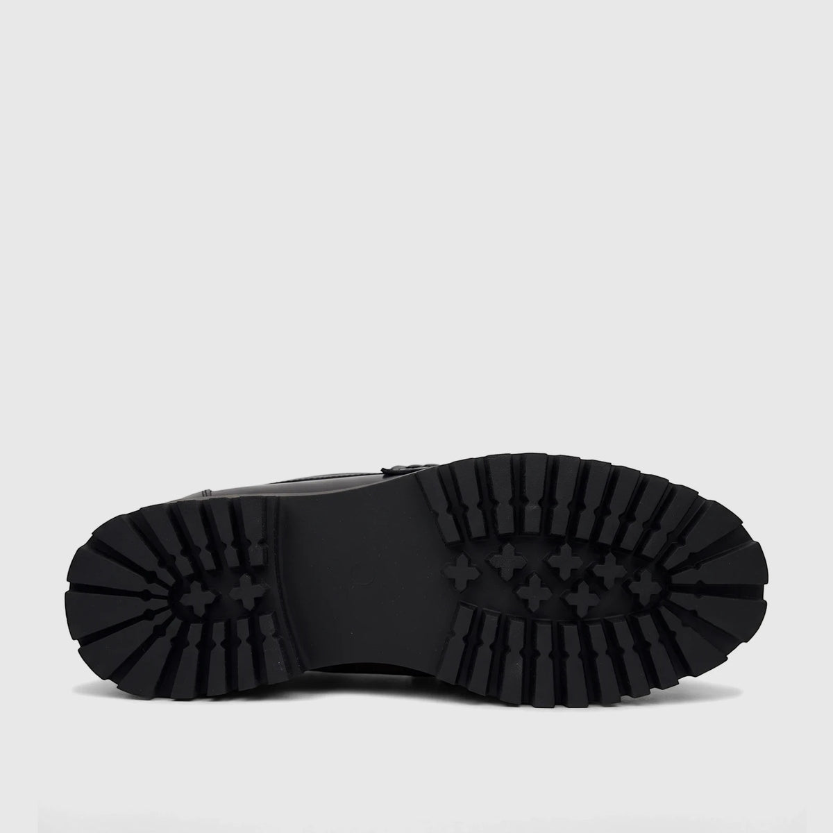 Bottom view of a Klevas Men's Chunky Sole Loafer Lufiano K8195M, showcasing its durable black rubber sole with deep,