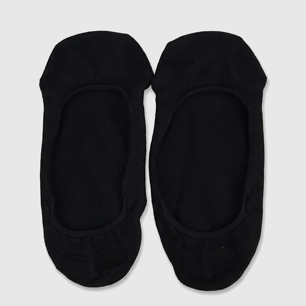 A pair of black ladies bamboo invisible socks, designed for a discreet fit, laid flat on a white surface.