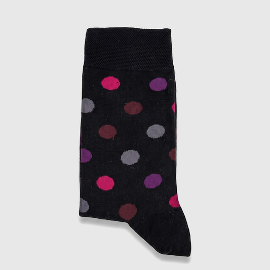 Black pure cotton ladies socks with vibrant pink, purple, gray, and burgundy polka dots, folded neatly.