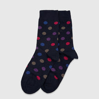 Two navy blue pure cotton polka dot socks for ladies, displayed flat lay with red, blue, purple, and brown spots.
