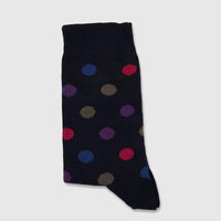 Ladies navy pure cotton socks with multicolored polka dot pattern in a flat lay studio shot.