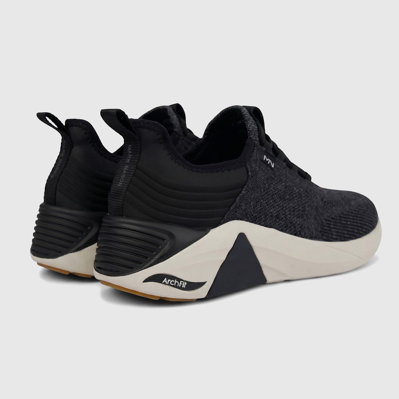 A pair of Mark Nason X Skechers A Linear 133257 ladies comfort sneakers in black and grey, shown from the rear-side.