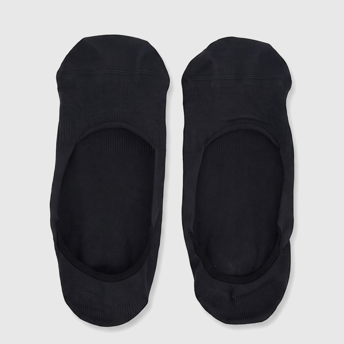 Two pairs of men's smokey grey bamboo invisible socks laid flat, highlighting the no-show design and soft texture.