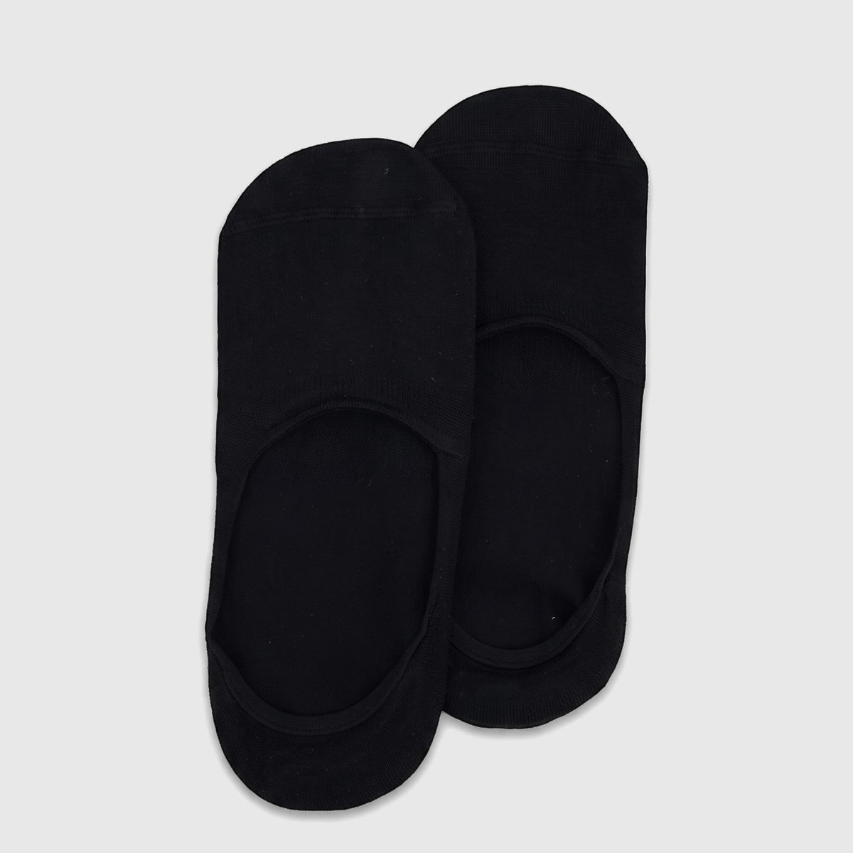 A pair of men's black bamboo invisible socks, product code 10210, displayed flat-lay on a white surface, showcasing their