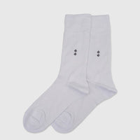 Pair of white Men's Bamboo Socks, UK size 6 to 11, with a subtle dark diamond pattern on the ankle, presented in a flat-lay