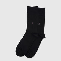 A pair of black men's bamboo socks with subtle patterned cuffs and a small geometric design on the ankles, laid flat.