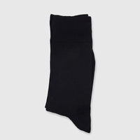 A pair of men's black micro modal socks, neatly folded and displayed in a flat lay style, showcasing their smooth texture.