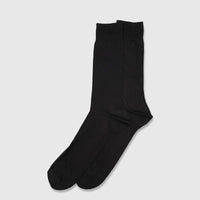 A pair of men's black rayon floss dress socks, folded neatly and displayed in a flat-lay arrangement from a top-down view.