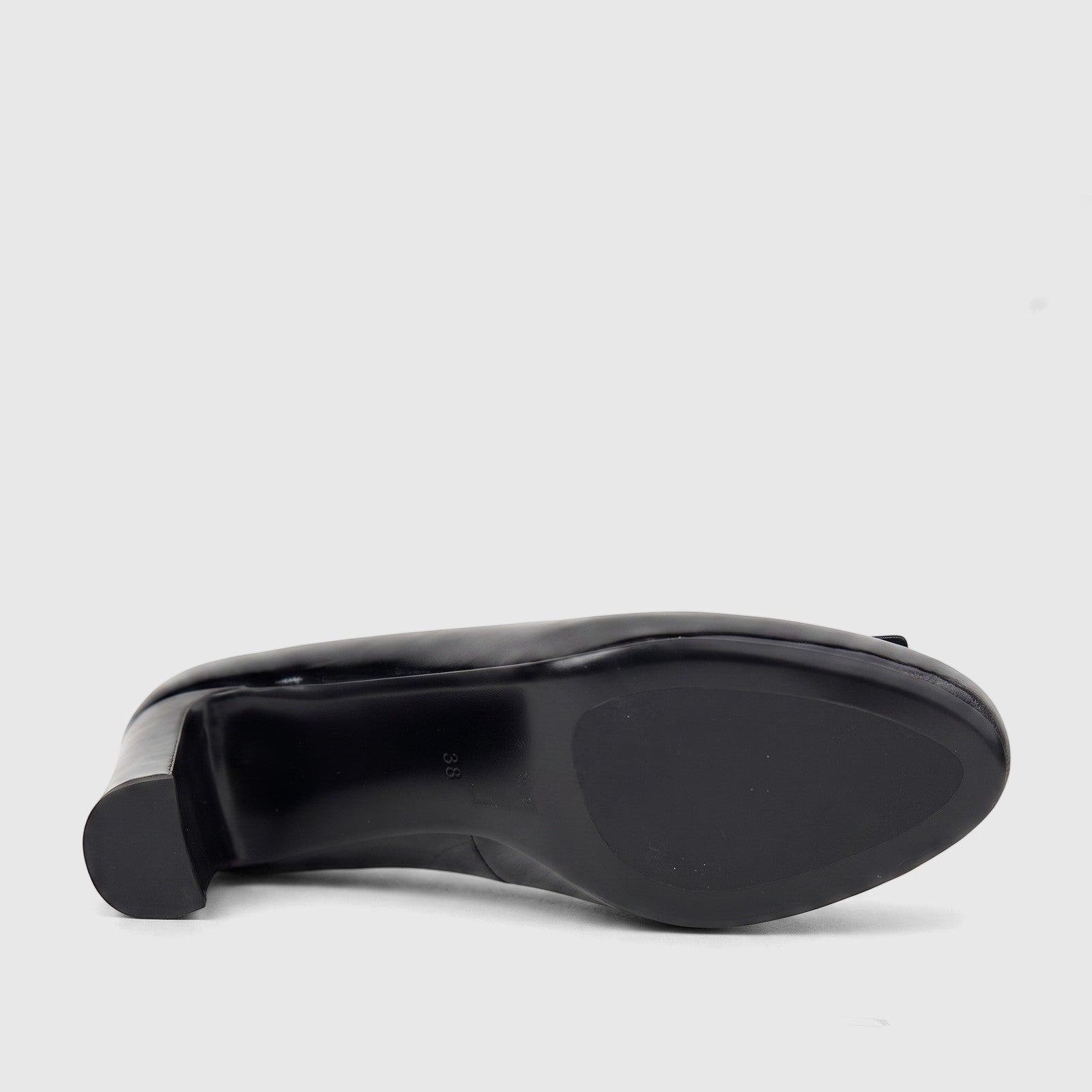 Morbido Ladies Black Leather Dress Court Shoe, featuring the bottom sole with size 38 and a block heel, lying on its side.