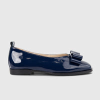 Morbido Ladies Leather Pump in dark blue patent leather, featuring a rounded toe and a decorative bow, viewed from the side.