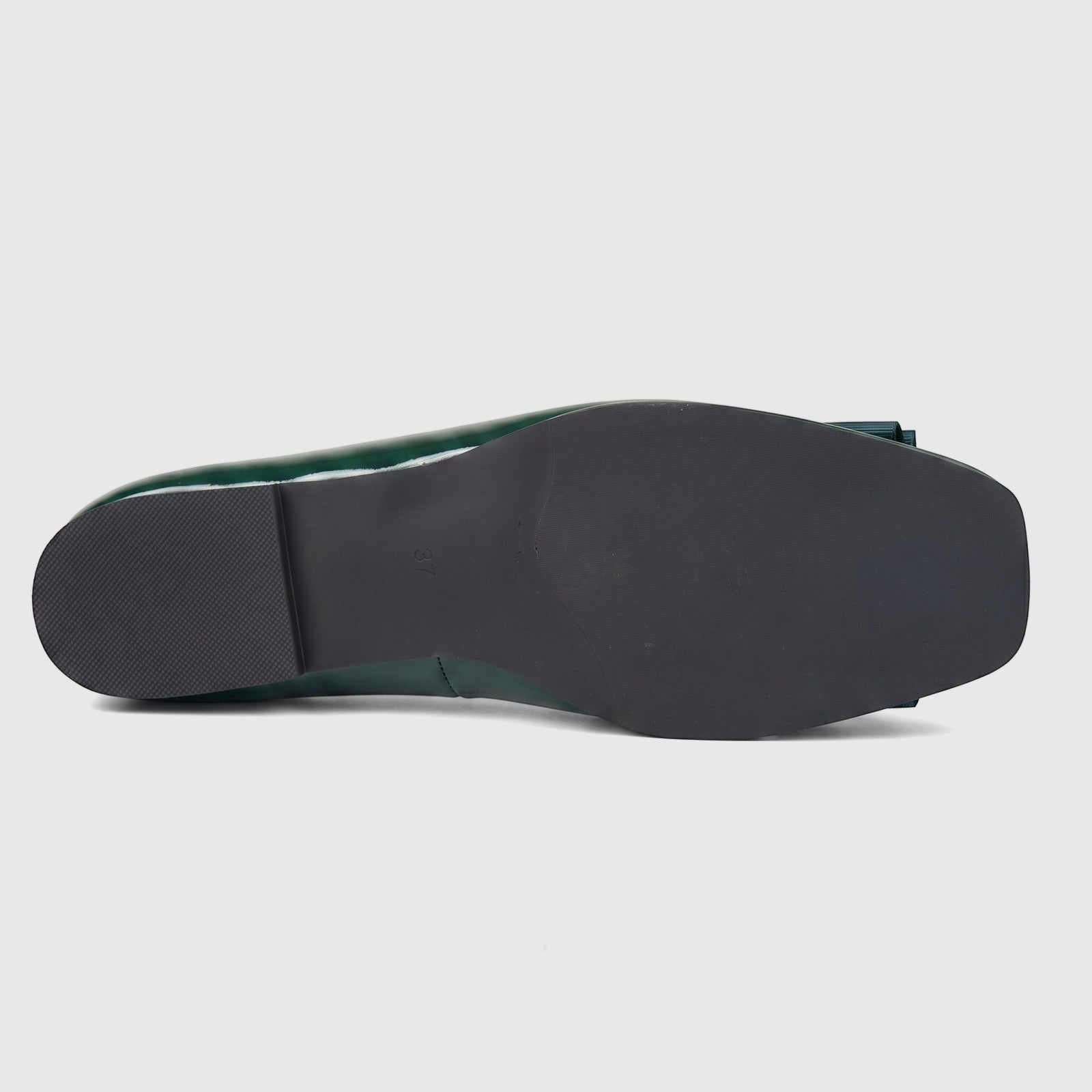 Bottom view of a Morbido ladies dark green patent leather pump, showcasing the black sole with size 37 embossed.