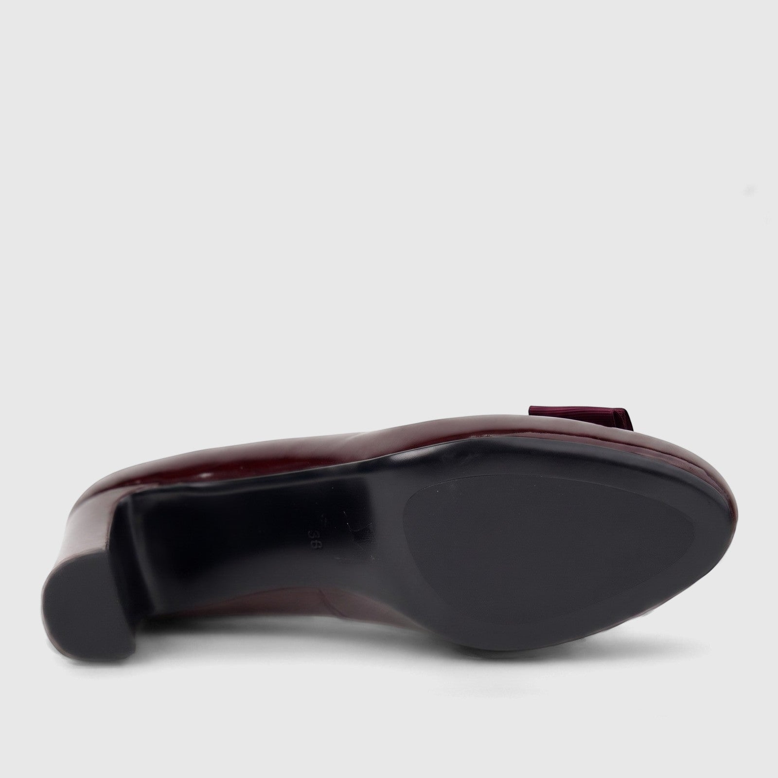 Morbido Ladies Leather Dress Court Shoe in wine red patent leather, featuring a block heel, viewed from the bottom side.
