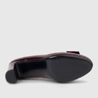 Morbido Ladies Leather Dress Court Shoe in wine red patent leather, featuring a block heel, viewed from the bottom side.