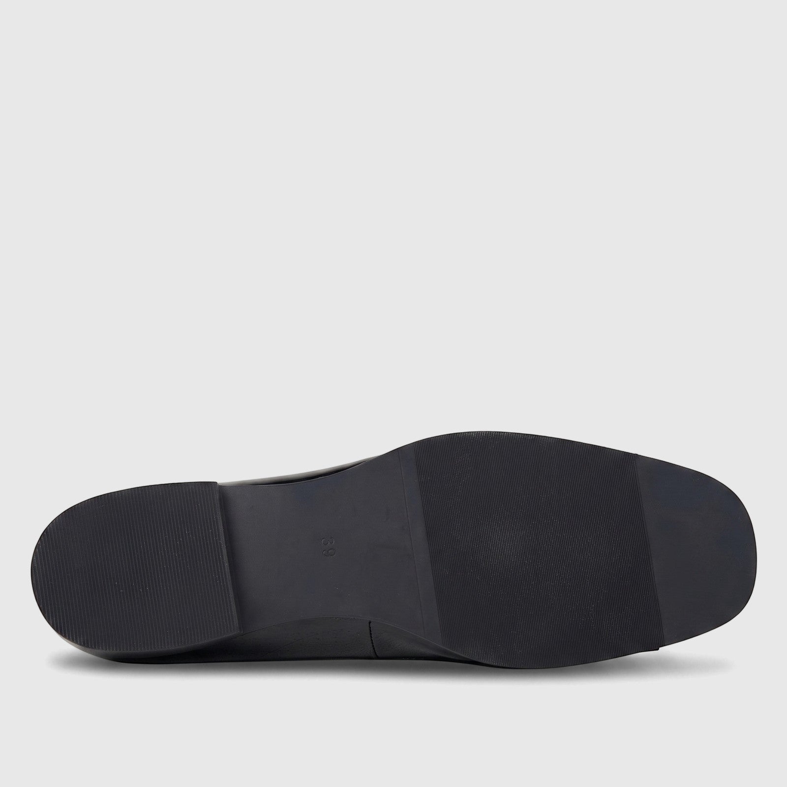Bottom view of a black Morbido Ladies Leather Pump, size 39, displaying the textured rubber sole for traction.