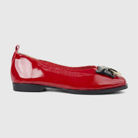 Morbido Ladies Leather Pump in dark red patent leather, featuring a stylish black and gold buckle, shown from the side.