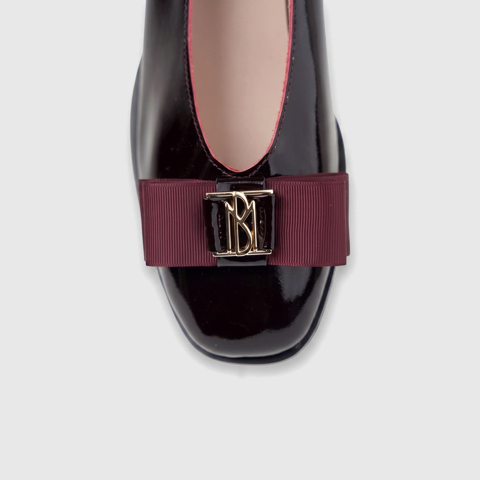Morbido Ladies Leather Pump BIL-023 in wine red patent leather, featuring a burgundy grosgrain ribbon and gold 'BM' buckle.