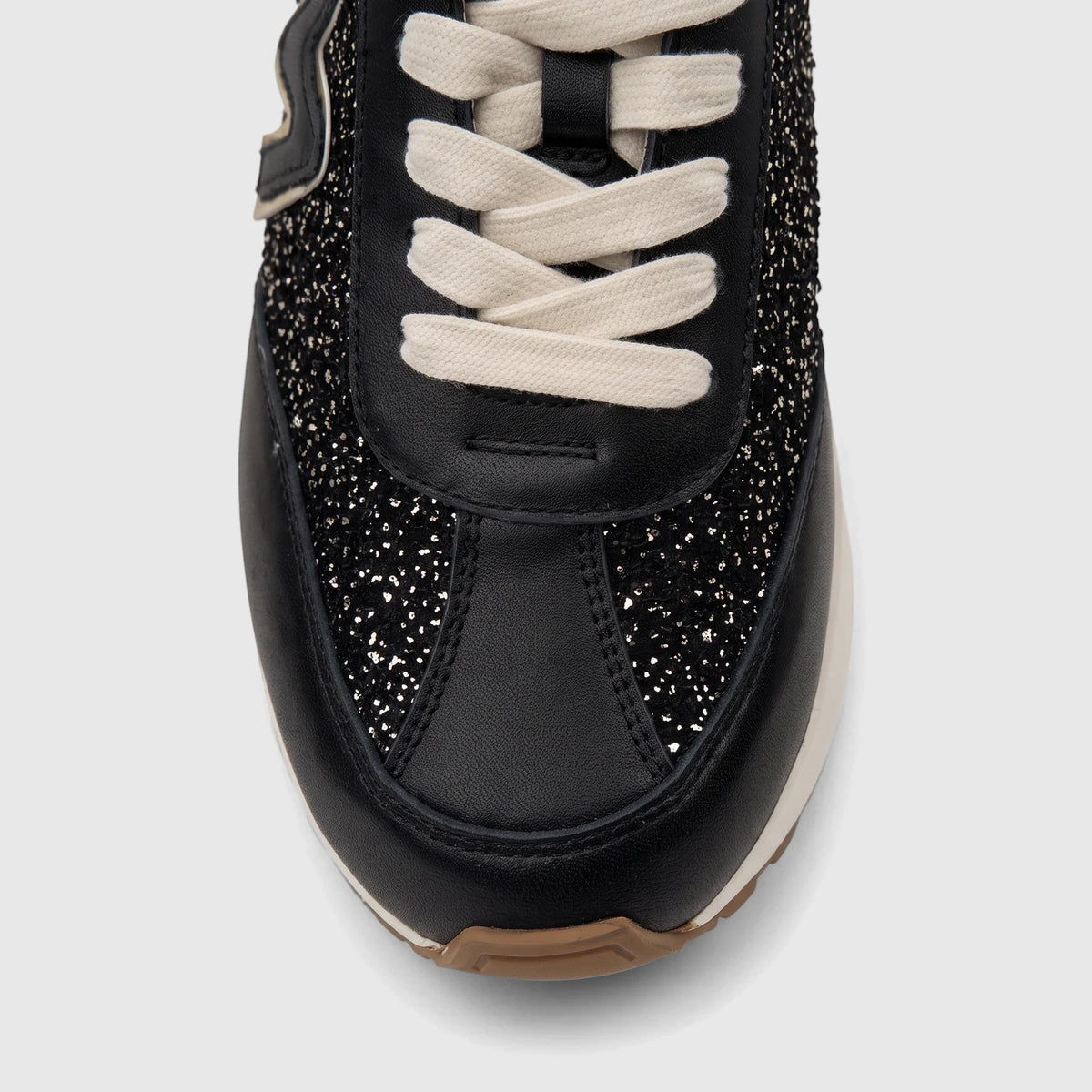 Morbido Ladies Leather Sneaker Black HAS-004, featuring glittery panels and white laces, presented in a close-up front view.